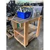 Image 2 : WOODEN ROLLING WORK STATION WITH BOX OF ASSORTED STRAPS, WORK LIGHT, AND EXTENSION CORDS
