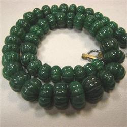855 CTS CARVED ENHANCED EMERALD STRAND 20-11 MM - 18 INCHES - TEMPORARY CLASP
