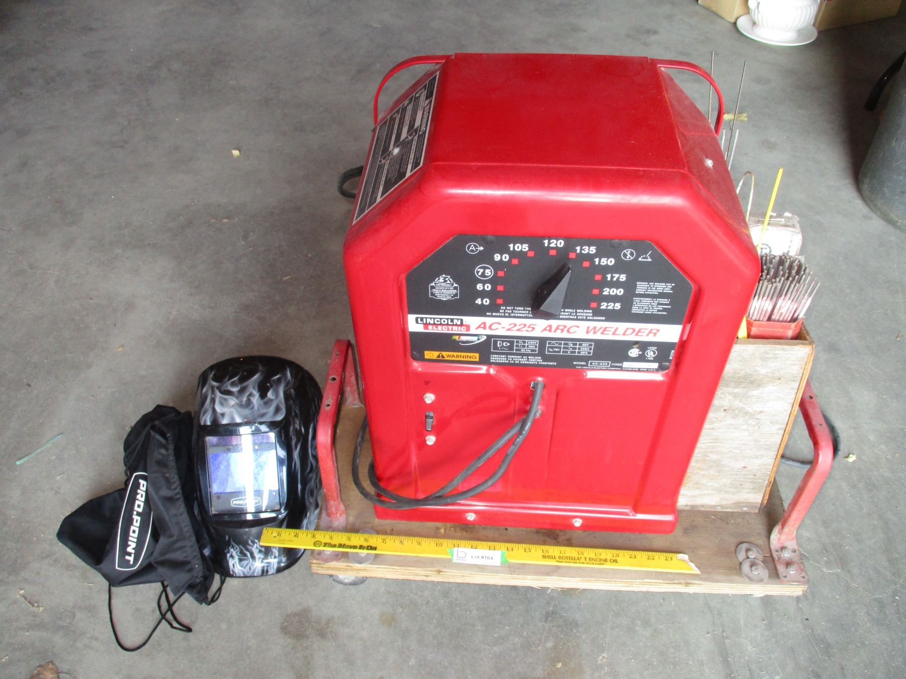 Lincoln Electric AC-225 Arc Welder, propoint safety helmet, cart, sticks