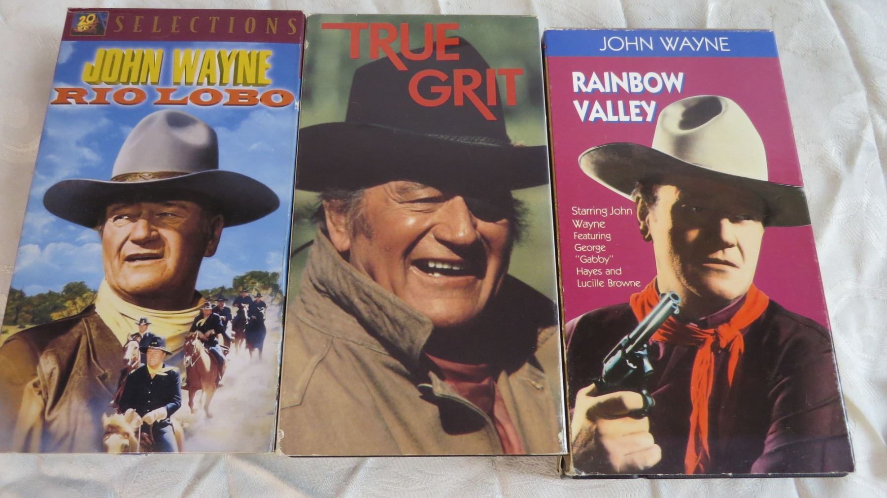 John Wayne Movies + Boot Spurs - Bodnarus Auctioneering