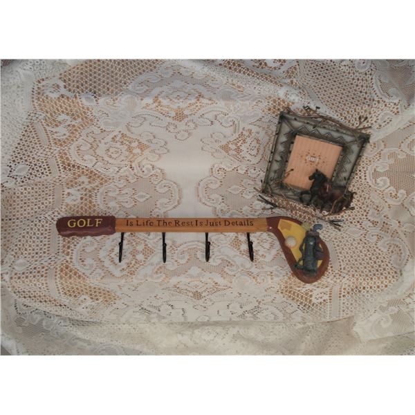 Gold rack and equestrian frame