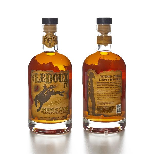 LEDOUX IT whiskey bottle signed by Chris LeDoux’s son, Ned LeDoux and a whiskey decanter and 4 glass