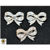 Image 1 : THREE SILVER TONE BOW PINS