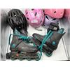 Image 2 : Lot of kids bike helmets and rollerblades