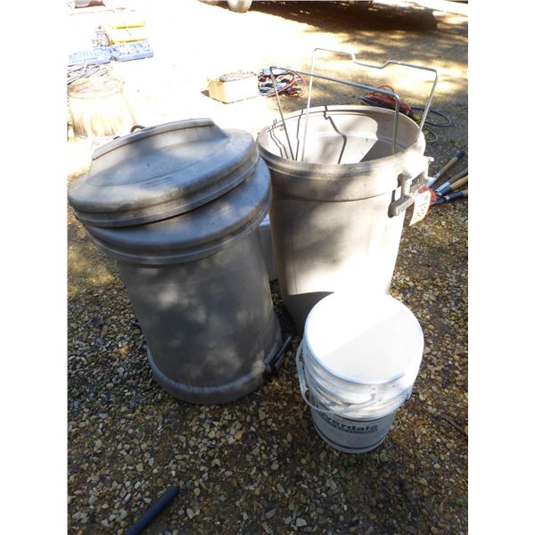2- Rolling Rubbermaid garbage cans