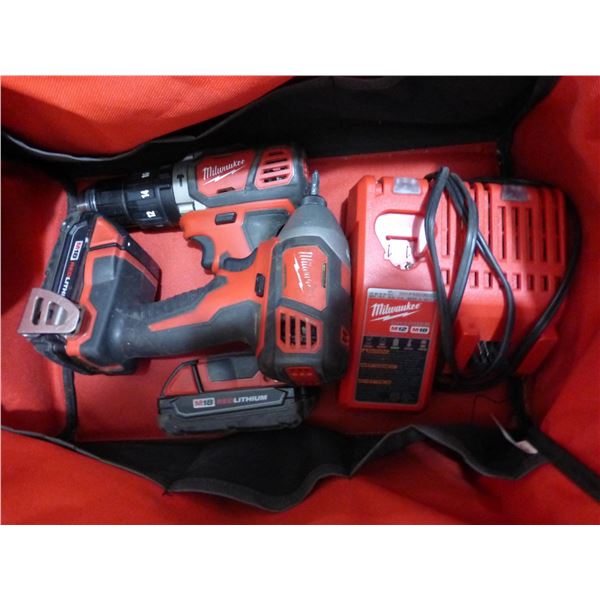 2- Milwaukee cordless drills c/w charger and 2- 18V batteries