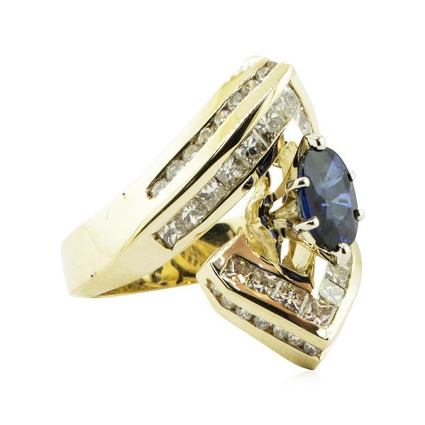 3.16 ctw Oval Brilliant Blue Sapphire And Diamond Ring - 14KT Yellow Gold