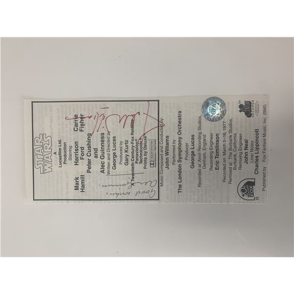 Star Wars Alec Guinness and John Williams signed soundtrack page. GFA authenticated