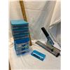 Image 1 : Stapler and small storage bins