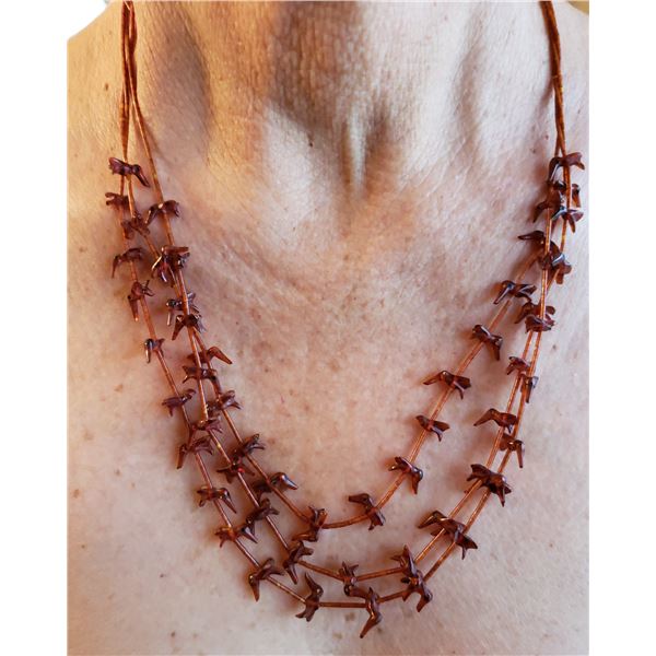 Amber fetish necklace by Ron Upshaw