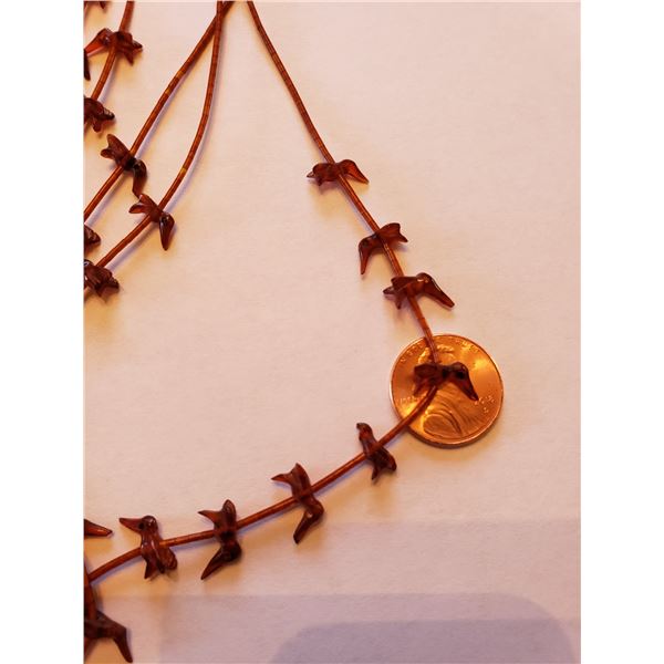 Amber fetish necklace by Ron Upshaw 3rd photo