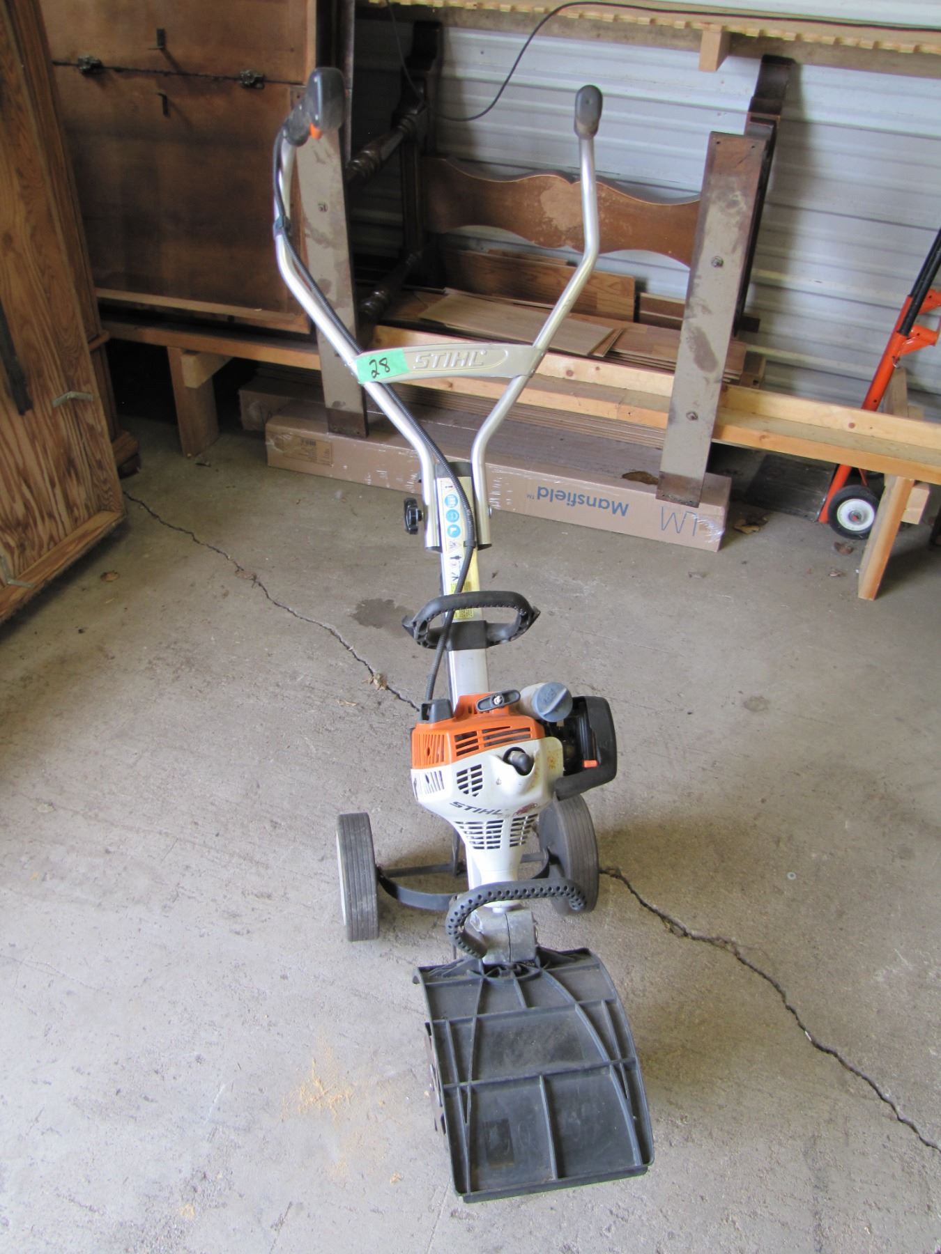 Stihl MM55 rotor tiller with attachments