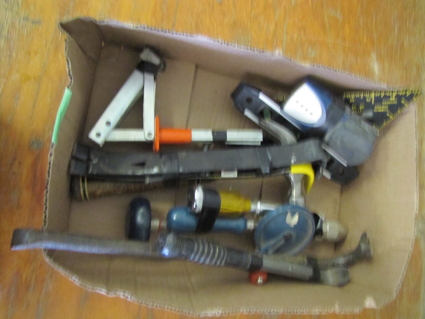 Box with pry bars hammer small level etc