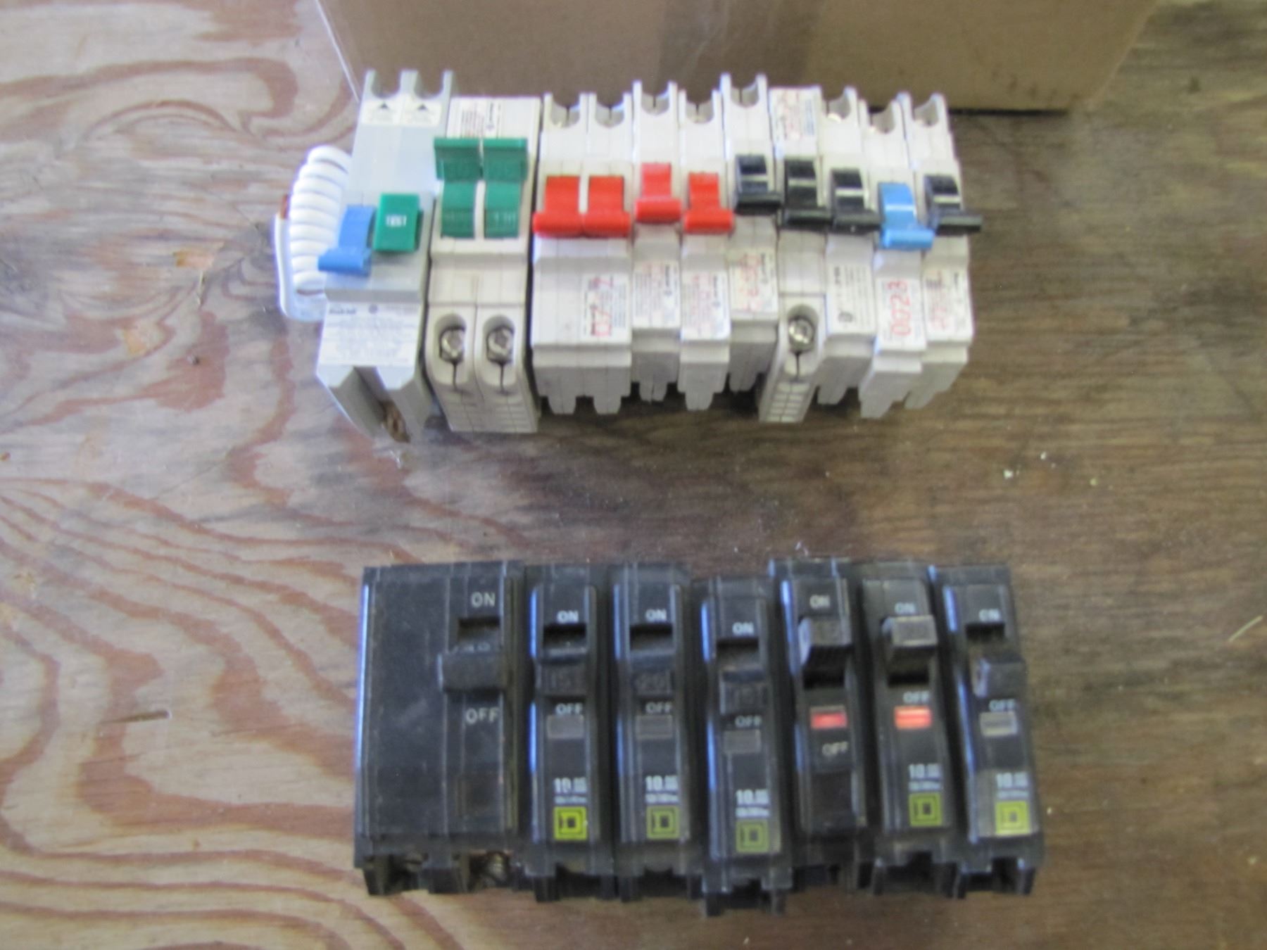 Box of FPE Breakers and Square D Breakers