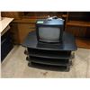 Image 1 : Television stand with small Memorex TV with remote