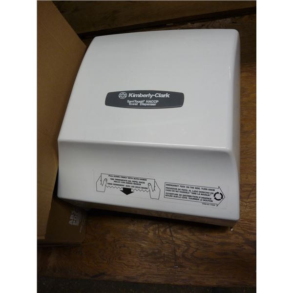 KimberlyClark paper towel dispenser and eight rolls of paper towel