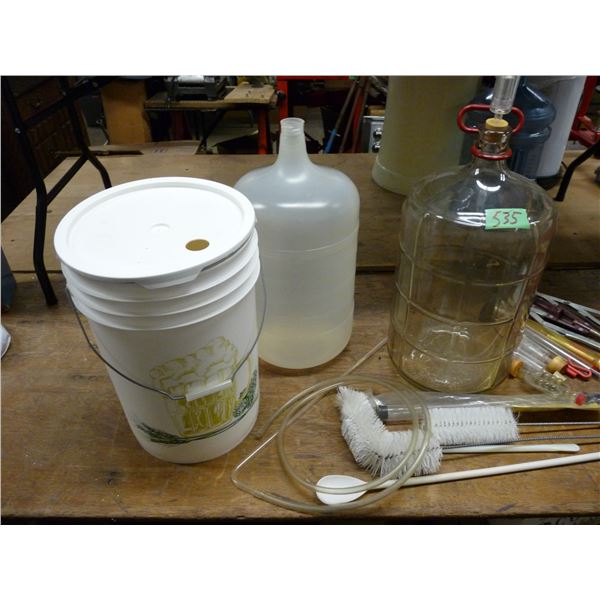 Winemaking kit starter pail with plastic carboy , racking tube, glass