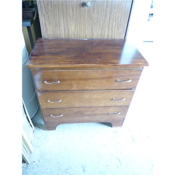Three drawer dresser with mirror has been refinished