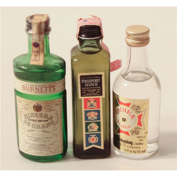 BURNETTS GIN, PASSPORT SCOTCH, TROIKA VODKA
