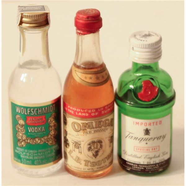 WOLFSCHMIDT VODKA, OMEGA BRANDY, TANQUERAY GIN