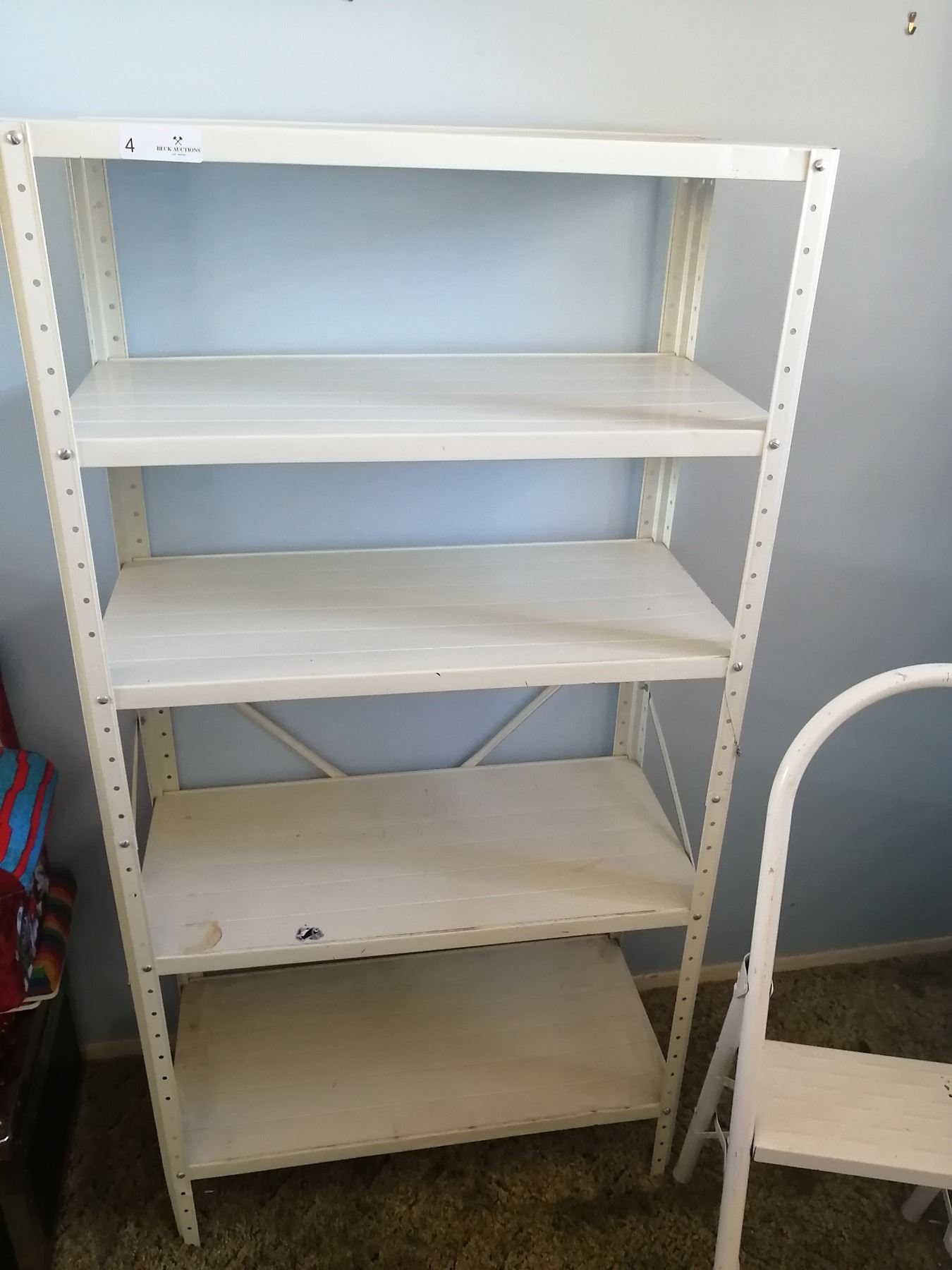 Metal Shelving Unit and Step Ladder Beck Auctions Inc.