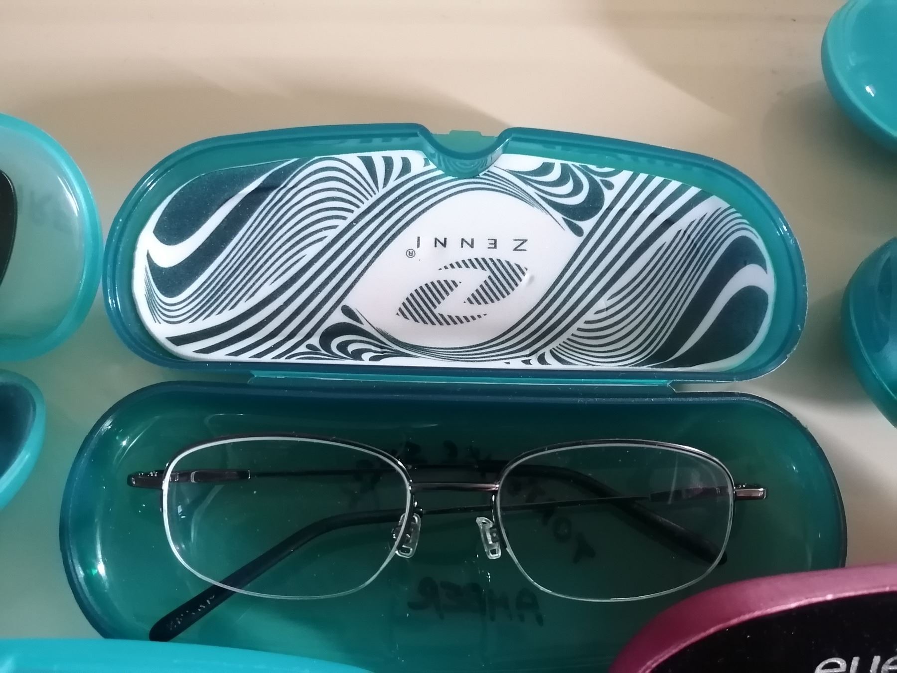 Assorted Clear ZENNI Eyeglasses w/ Cases Beck Auctions Inc.