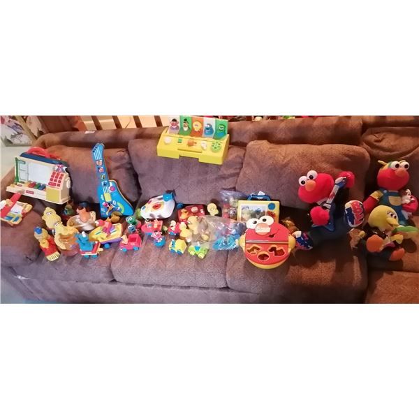 Assortment of Vintage Sesame Street Toys