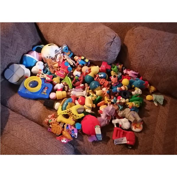 Assortment of Sesame Street, Disney, and Other Figurines