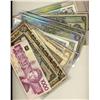 Image 1 : Miscellaneous lot of Canadian and World banknotes.  Incldes a variety of world notes (2), and Canadi