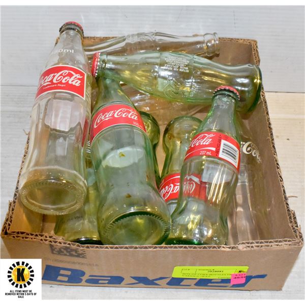 BOX OF COKE BOTTLES FROM VARIOUS ERA'S