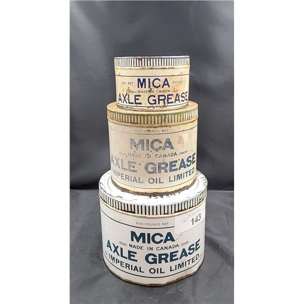 THREE ANTIQUE MICA AXEL GREASE CANS