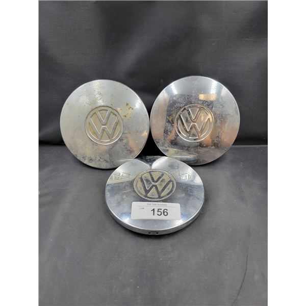 THREE VINTAGE VOLKSWAGEN HUBCAPS