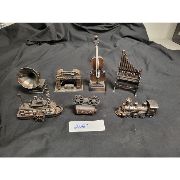 SEVEN FIGURAL PENCIL SHARPENER'S