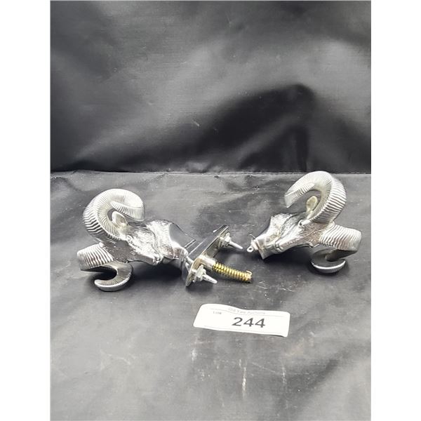 TWO DODGE RAM HOOD ORNAMENTS