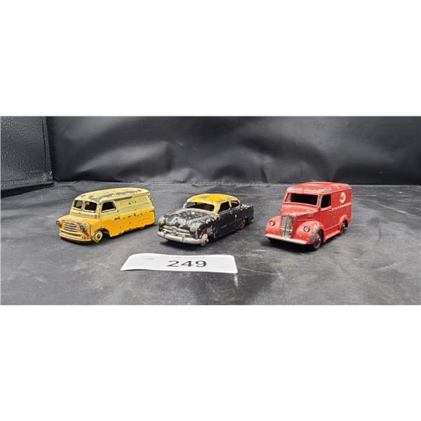 THREE VINTAGE DINKY TOYS