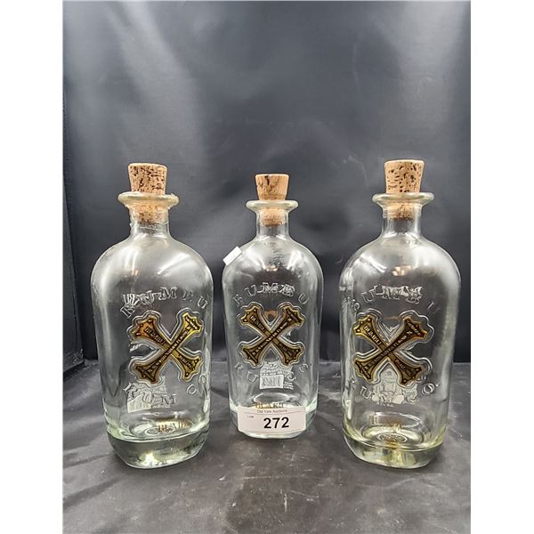 THREE BUMBU EMBOSSED RUM BOTTLES