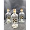 Image 1 : THREE BUMBU EMBOSSED RUM BOTTLES