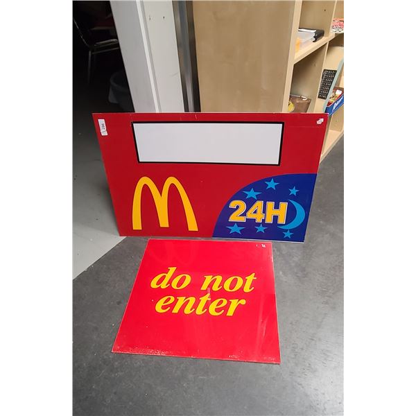 TWO MCDONALDS SIGNS