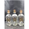 Image 1 : THREE BUMBU EMBOSSED RUM BOTTLES