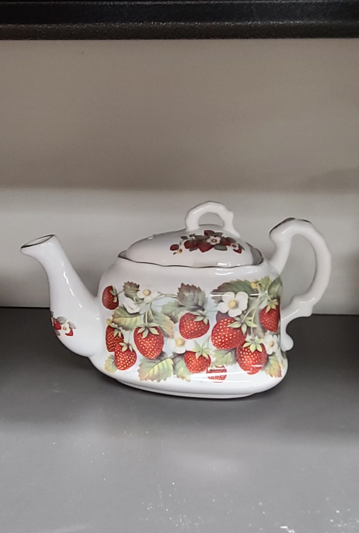 TWO VINTAGE TEAPOTS