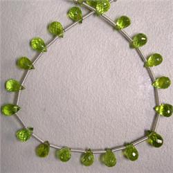 33 CTS PERIDOT BRIOLETTE STRAND 6x4 MM