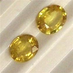 0.65 CTS PAIR OF YELLOW SAPPHIRES 5x4 MM