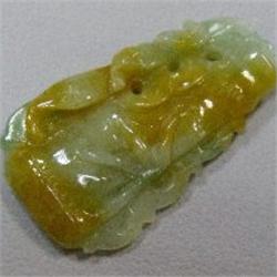 85 CTS CARVED JADE 53x29 MM