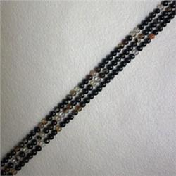 THREE STRANDS OF 2 MM STRIPPED BLACK AGATE