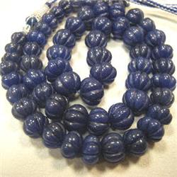 452 CTS CARVED GLASS FILLED COLOR ENHANCED SAPPHIRE STRAND 16-7 MM - 16 INCHES - TEMPORARY METAL CLA