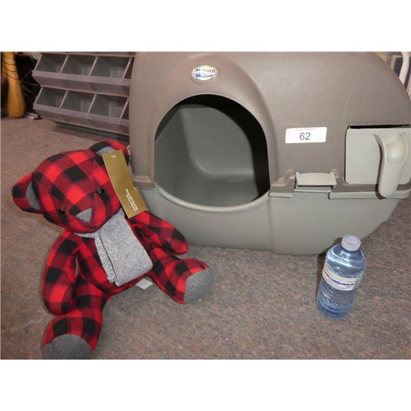 litter box, stuffed bear