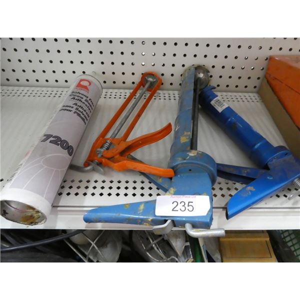 caulking guns & tube of adhesive