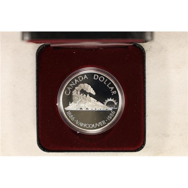 1986 CANADA SILVER "VANCOUVER" $1 (PL) COIN IN