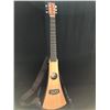 Image 1 : BACKPACKER TRAVEL GUITAR BY C.F. MARTIN, WITH STRAP, PICK HOLDER AND ORIGINAL PADDED GIG BAG.