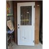 Image 1 : Solid Exterior Door with Window 79" x 32" - has dent on 1 side